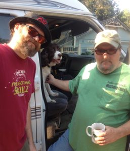 Artist Walter Simon, Jefferson the English Springer Spaniel, and Glynn Wilson of the New American Journal. 