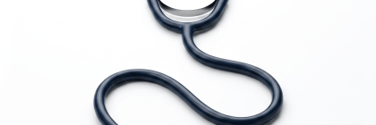 Stethoscope with dark blue tubing and metallic chest piece on a white background