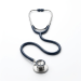 Stethoscope with dark blue tubing and metallic chest piece on a white background